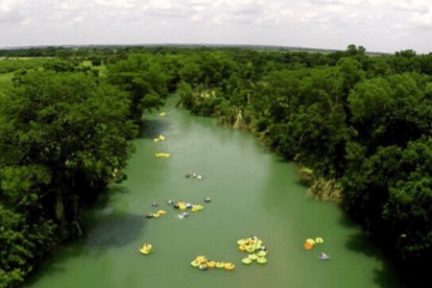 a large body of water surrounded by trees
