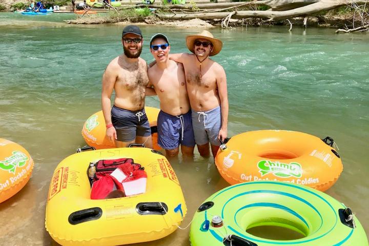 a group of people on a boat in the water