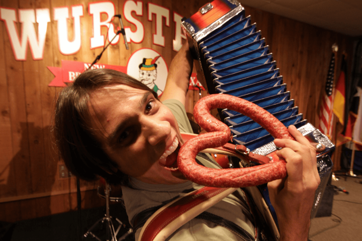 Man eating a sausage